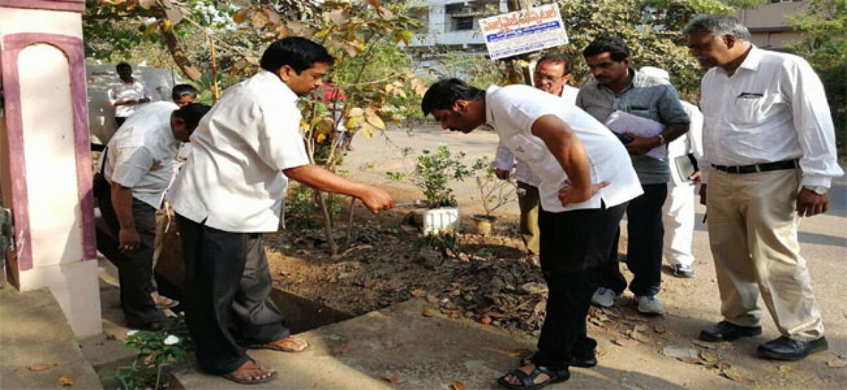 Civic chief inspects side drains