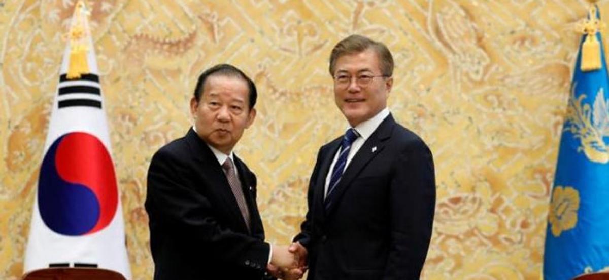 South Koreas Moon asks for Japans patience in resolving past history