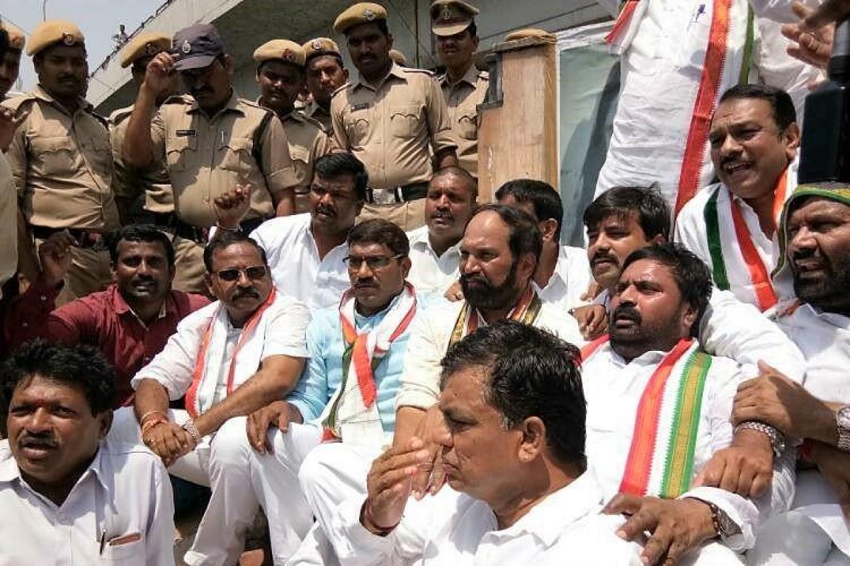 Telangana Congress holds dharna against TRS govt