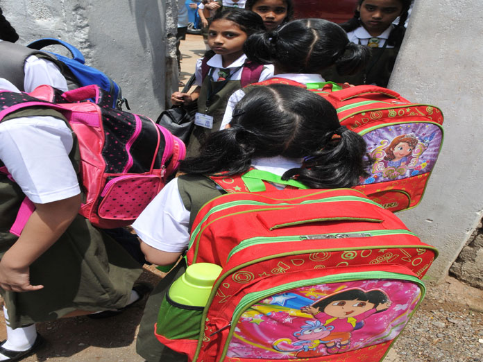 Back-breaking burden on school children