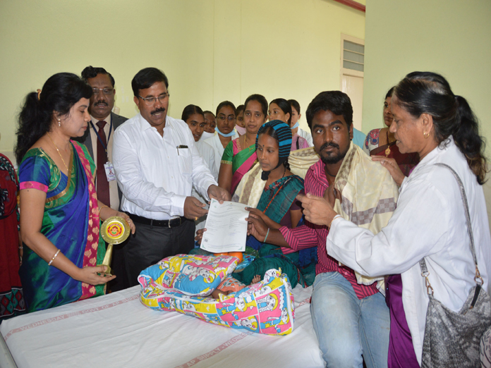 Birth certificates handed over to moms of newborn baby girls