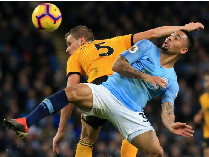 Premier League: Manchester City ease past 10-man Wolves to cut gap at top