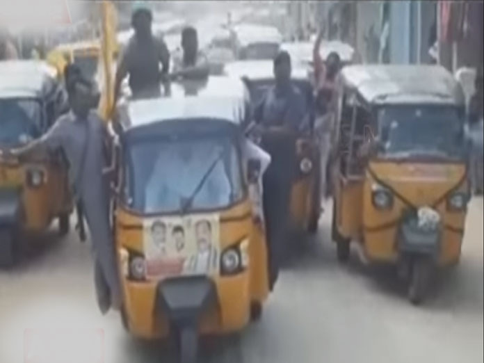 Minister Acham Naidu rides auto in Srikakulam district