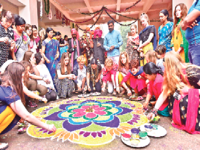 Foreign women add colour to Sankranti fest