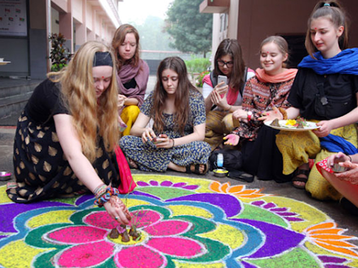 Foreign women take part in Sankranti celebrations in Warangal