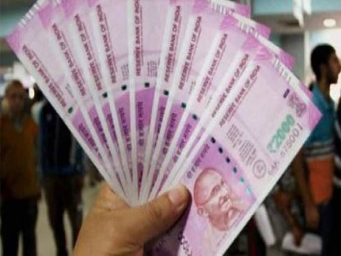 Rupee gains 26 paise per dollar in early trade as Fed keeps rates unchanged