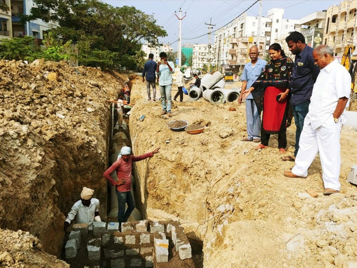 Corporator inspects storm drain works