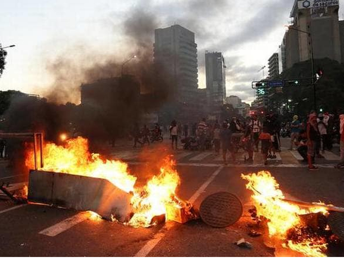 13 dead in two days of Venezuela unrest: rights group