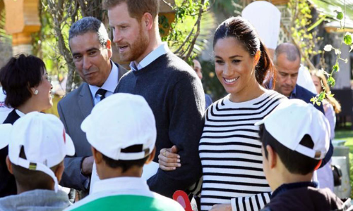 Harry and Meghan dress down to meet children on Morocco trip