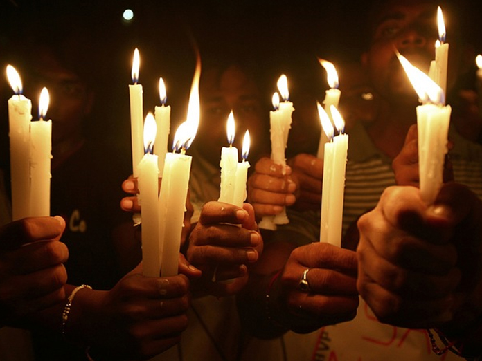 BJP, Congress take out candlelight marches