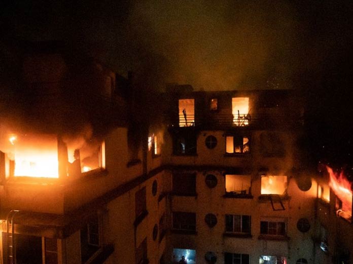 Eight dead in possible arson attack at Paris apartment block