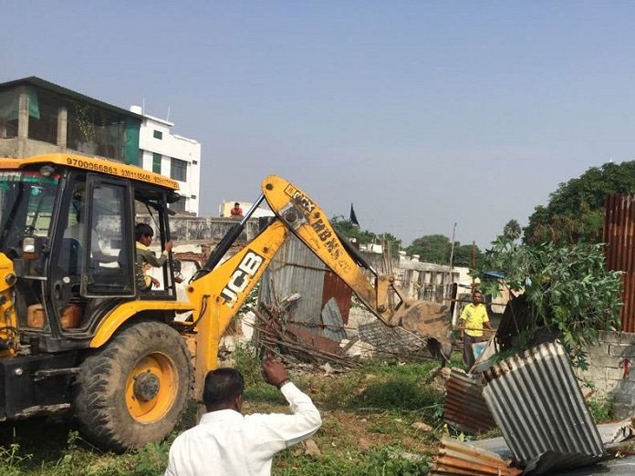 GHMC demolishes unauthorised constructions