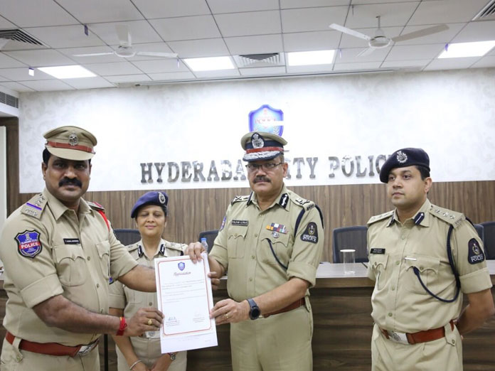 Inspector feted for bagging award