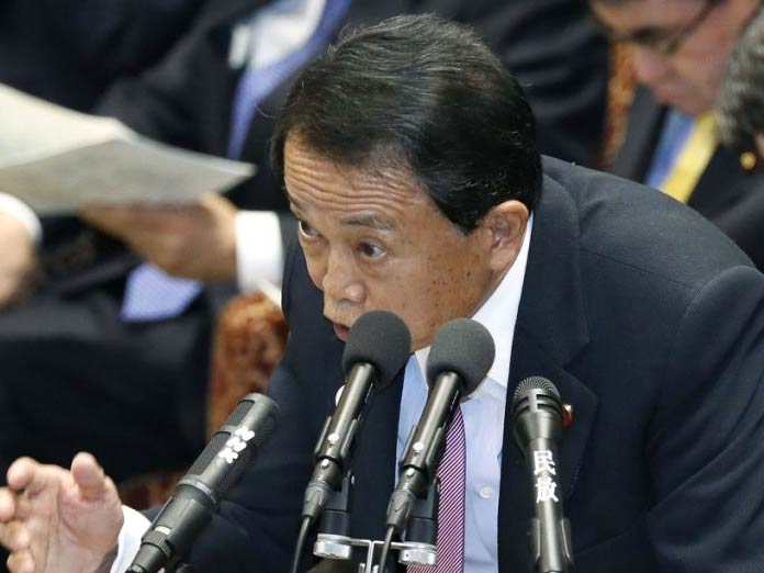 Japan finance minister Aso sorry for criticizing childless Japan