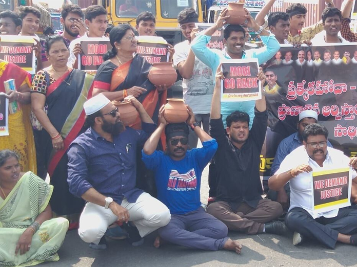 Protests greet Modi visit