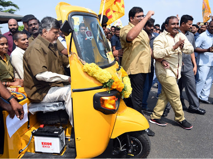 AP CM Chandrababu Naidu drives auto rickshaw in Amaravati