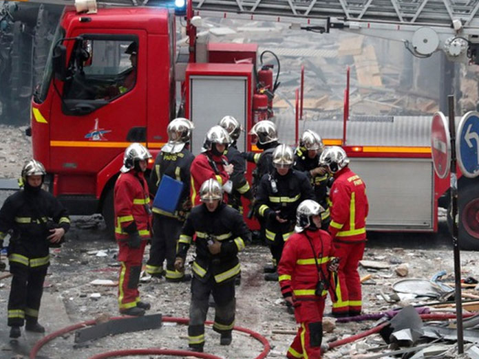 7 dead in building fire in upmarket Paris neighbourhood