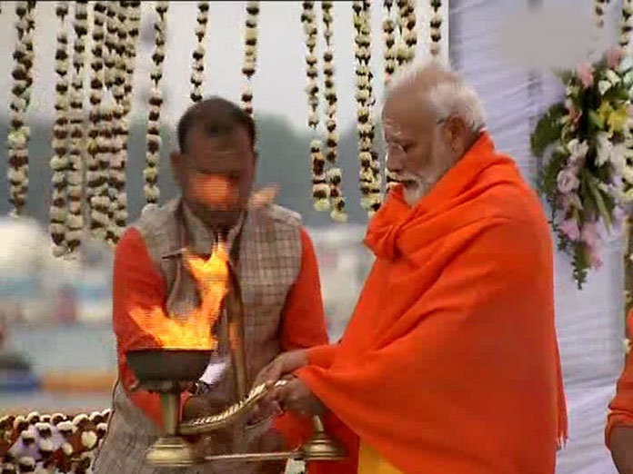 PM Modi takes holy dip, offers prayers at Kumbh in Prayagraj