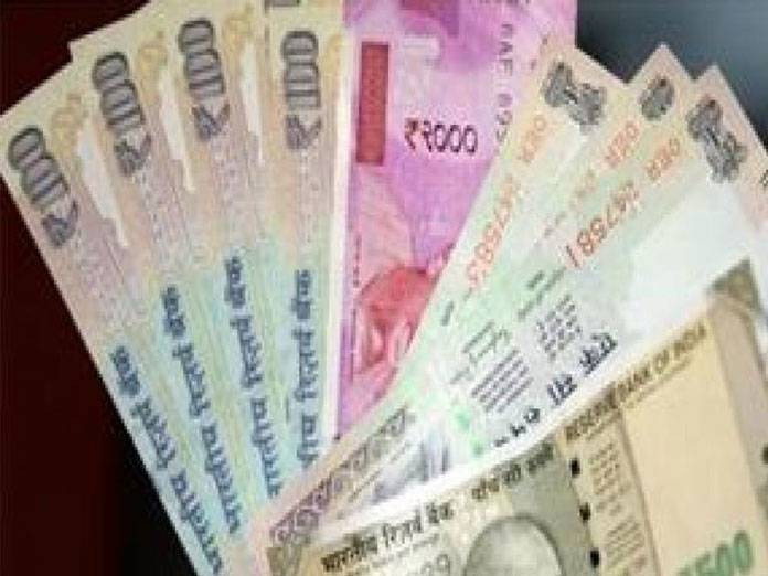 Rupee gains 6 paise against dollar in opening trade