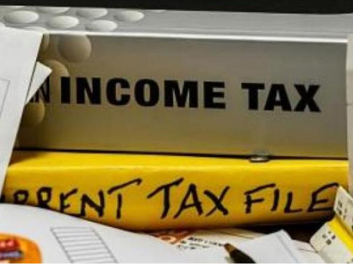 Income Tax officials are conducting raids on real estate firm in Hyderabad