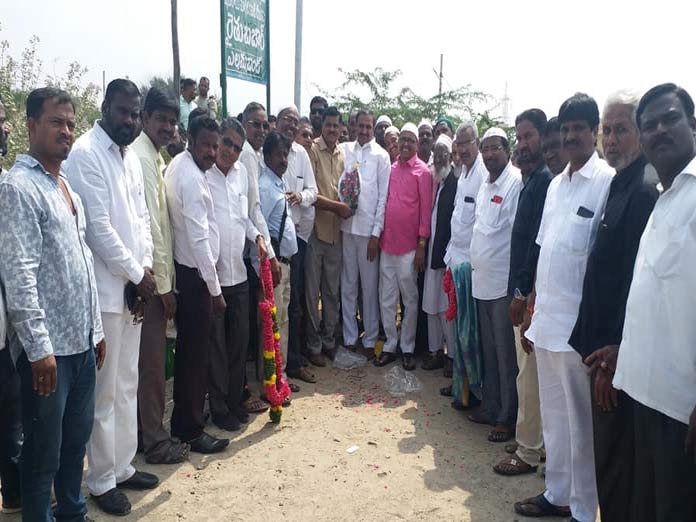 MLA lays stone for graveyard wall