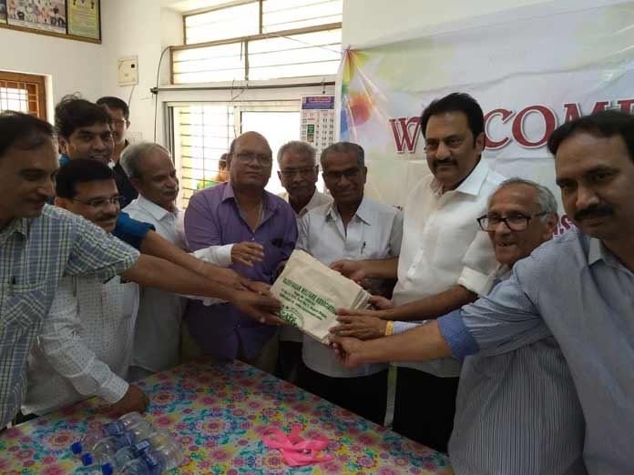 Cloth bags distributed to make colony plastic-free