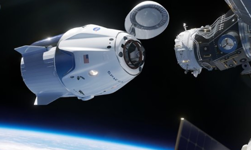 SpaceX Crew Dragon capsule docks at International Space Station