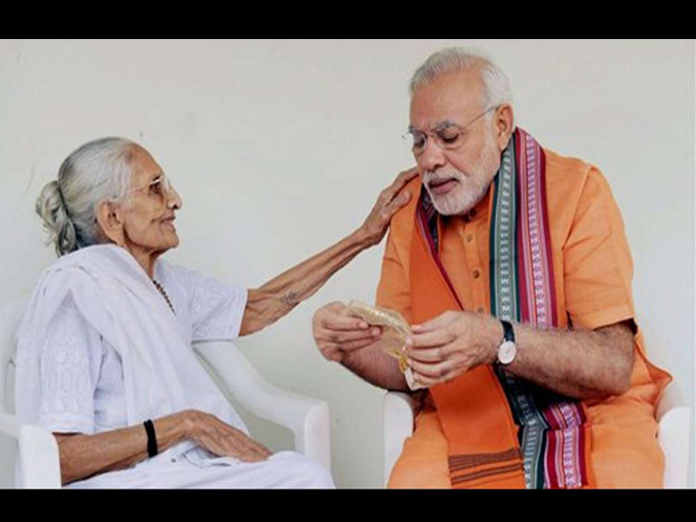 PM Modi Meets His Mother During Gujarat Visit
