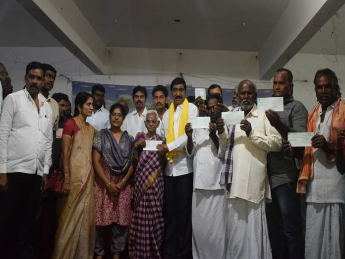 BC Janardhan Reddy presents 32 cr cheques to farmers