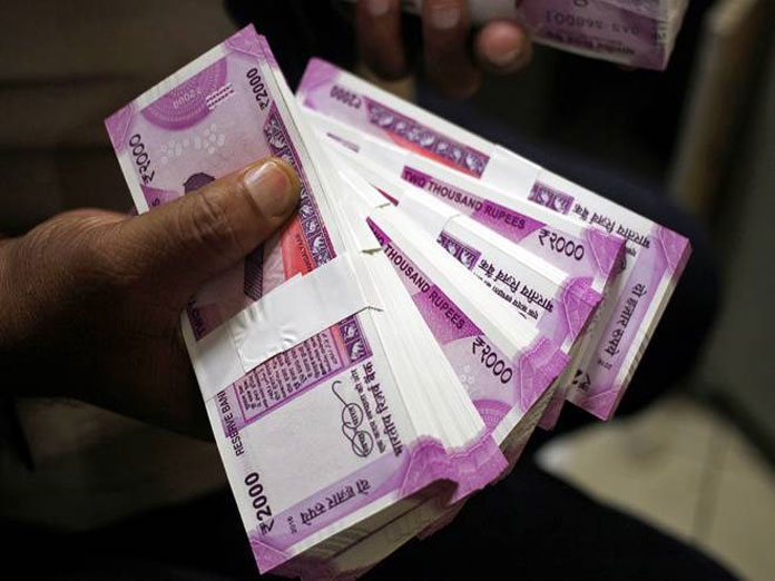 Rupee slips 14 paise against US dollar in early trade