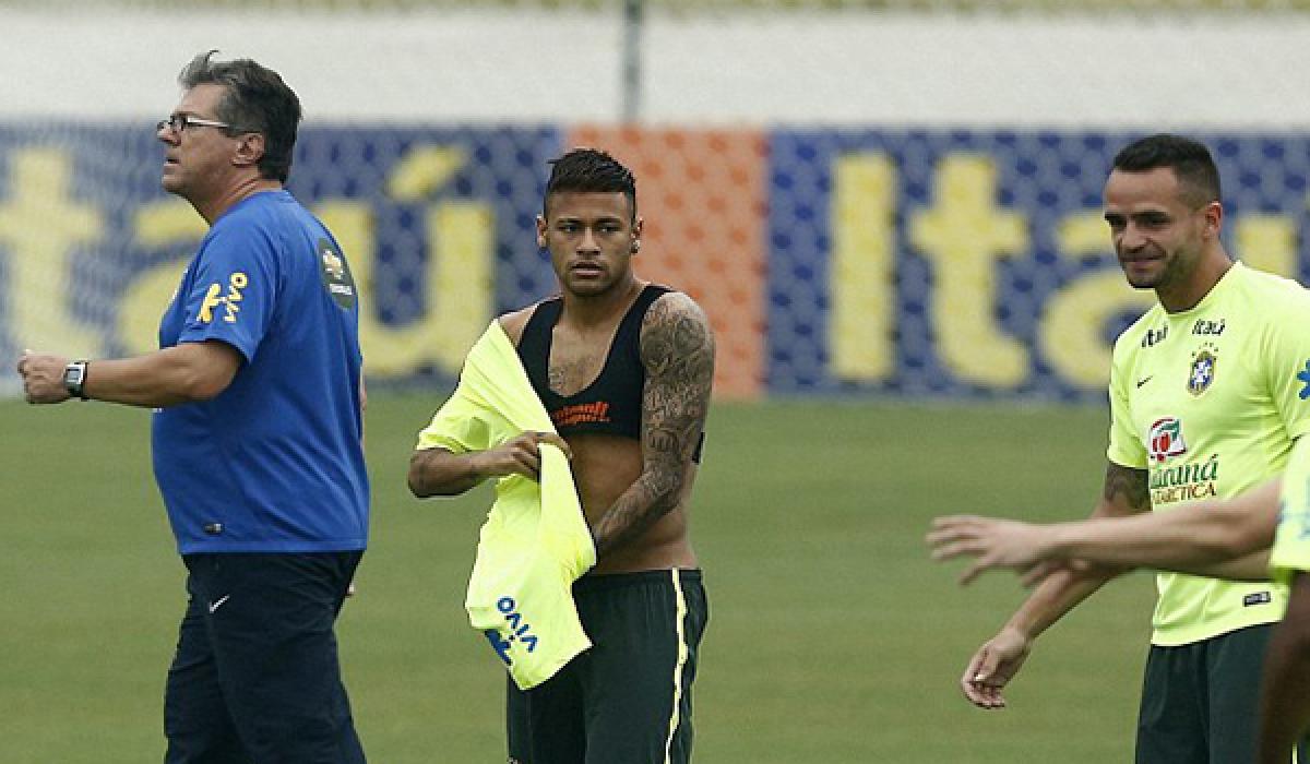 Neymar gets knocked by fan during training session