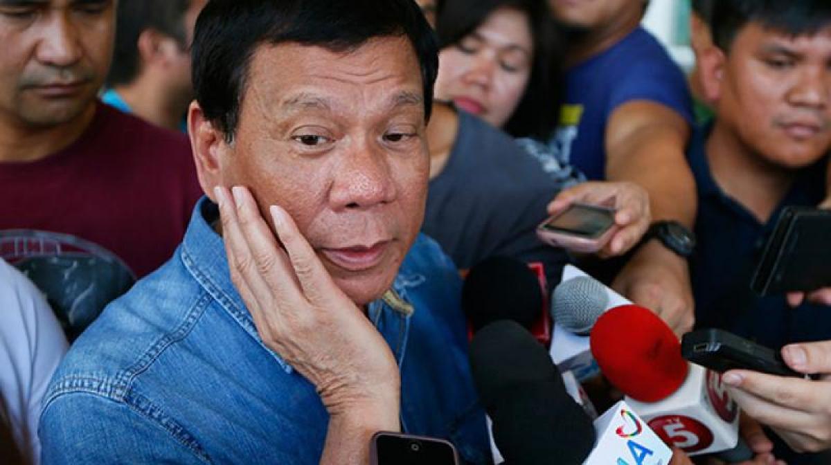 Philippines Duterte to visit Pope, apologise for whore insult