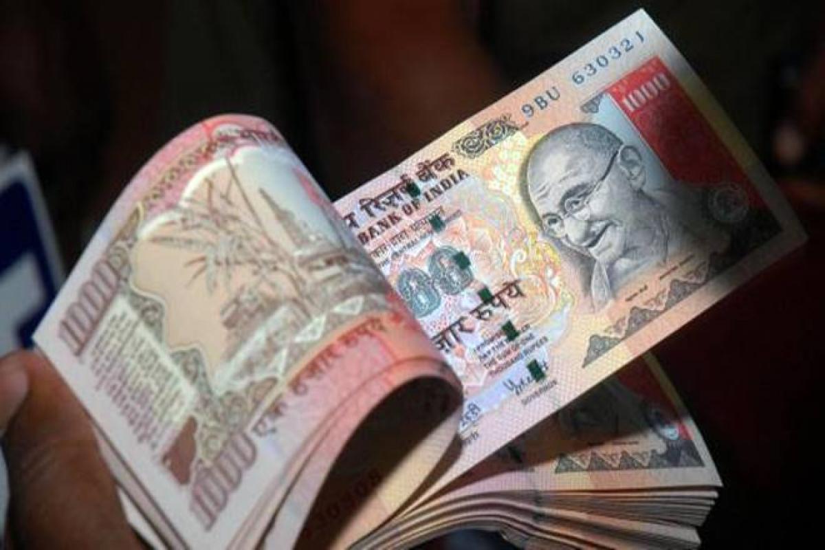 Rupee trims initial losses, still down 4 paise against dollar