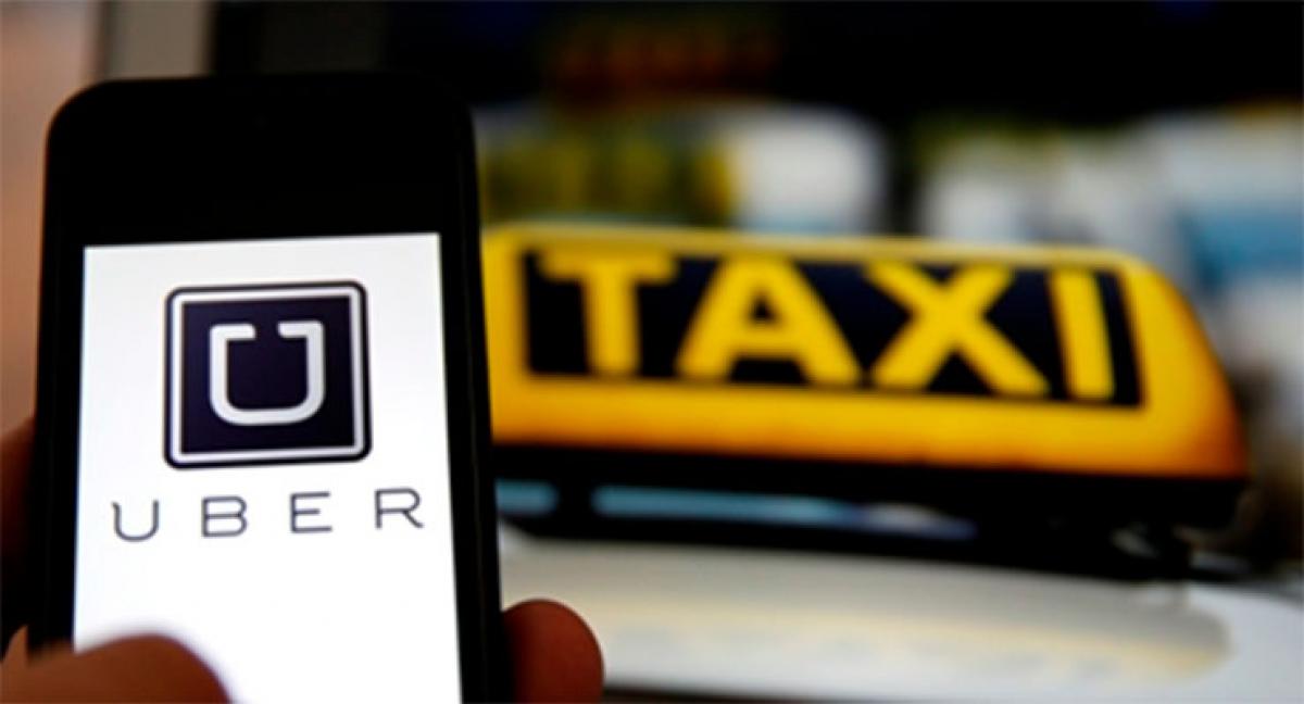 France bans Uber after cab drivers protest