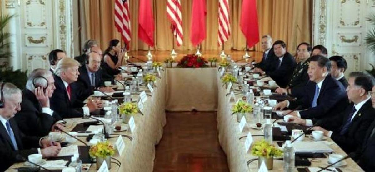 At U.S.-China summit, Trump presses Xi on trade, N.Korea; progress cited