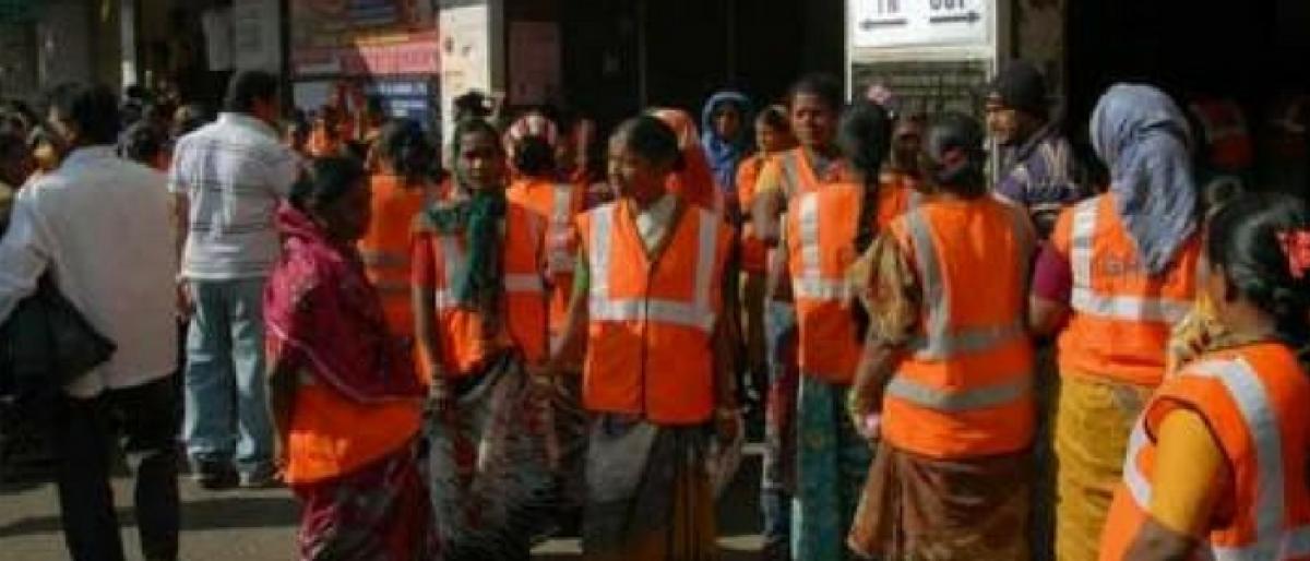 GHMC sanitation workers to get rain coats