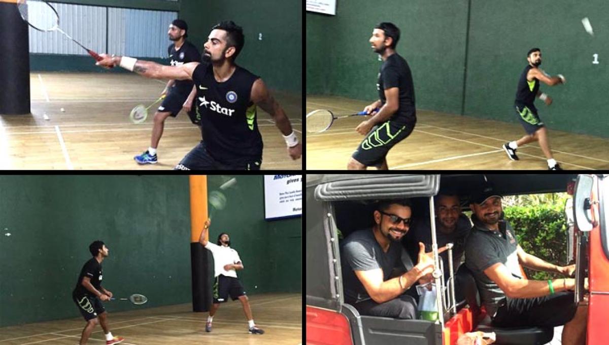 Indian cricketers enjoy a game of badminton