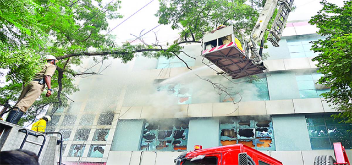 Fire at software company; Two staffers rescued