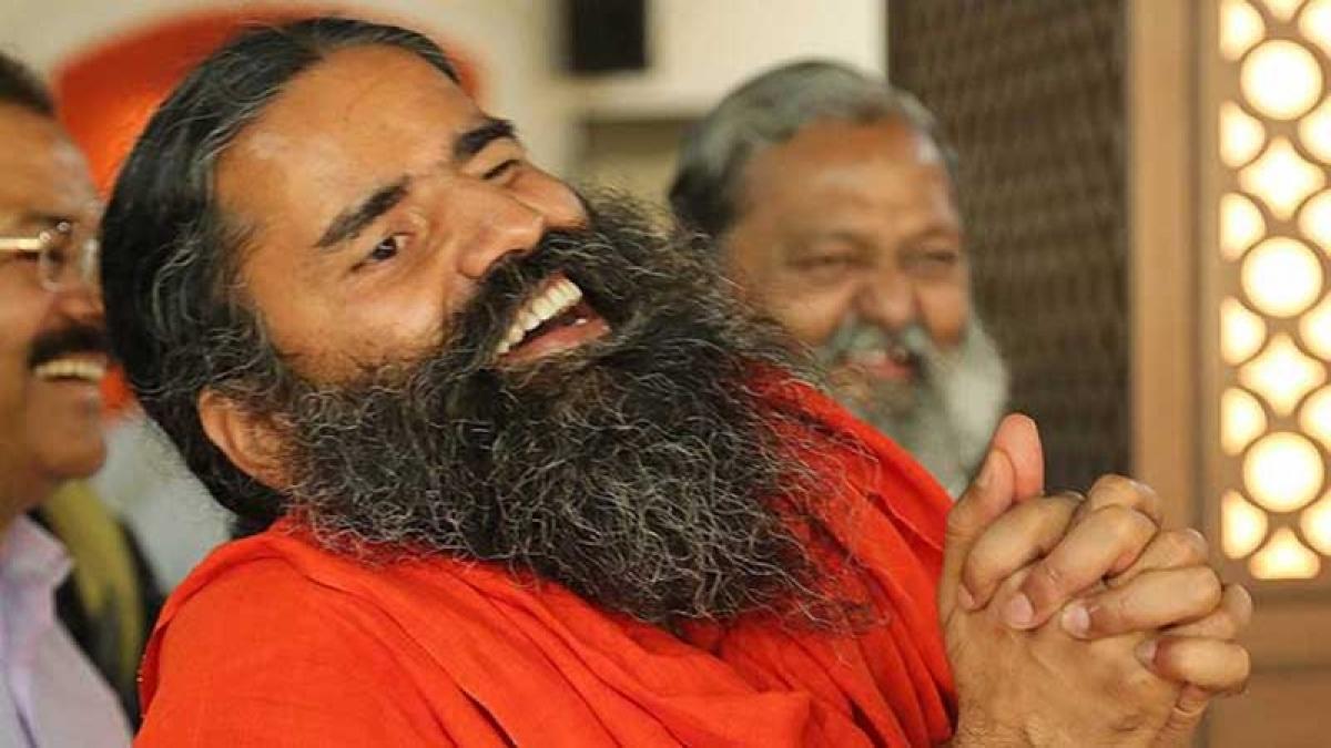 Ramdev guides through massive yoga event in Ahmedabad