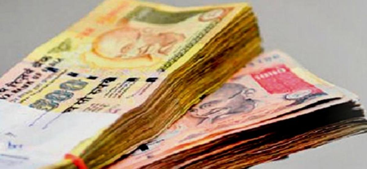 Rs 14.69 crores attached by ED for illegal conversion of old currency