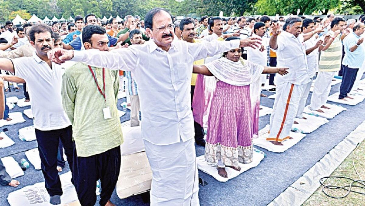 Yoga the integration of body, mind and intellect with self: Naidu