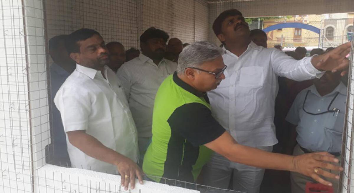 Mayor inspects community hall construction work at Moula Ali