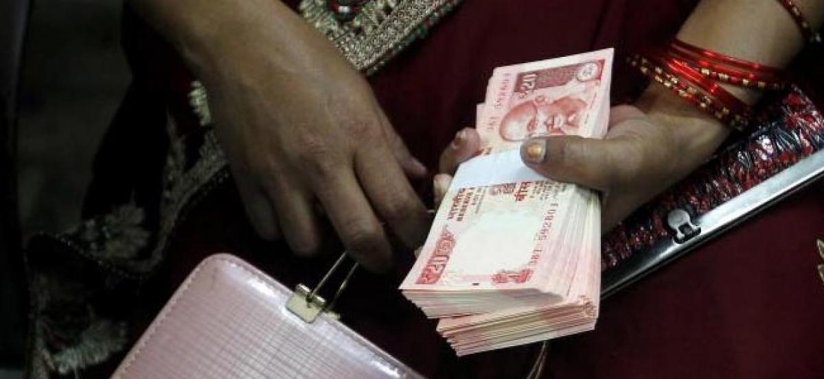 Rupee hits record low as emerging market rout intensifies