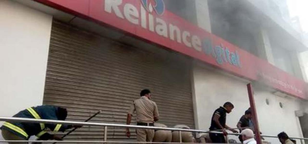 Fire accident at Reliance Digital showroom in Kacheguda