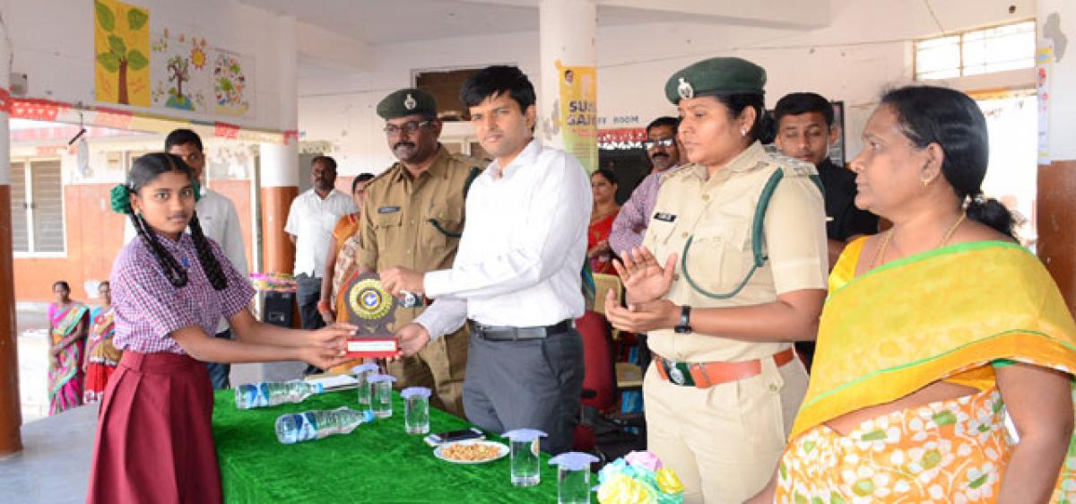 Gift saplings for greener planet, Sircilla Collector tells students