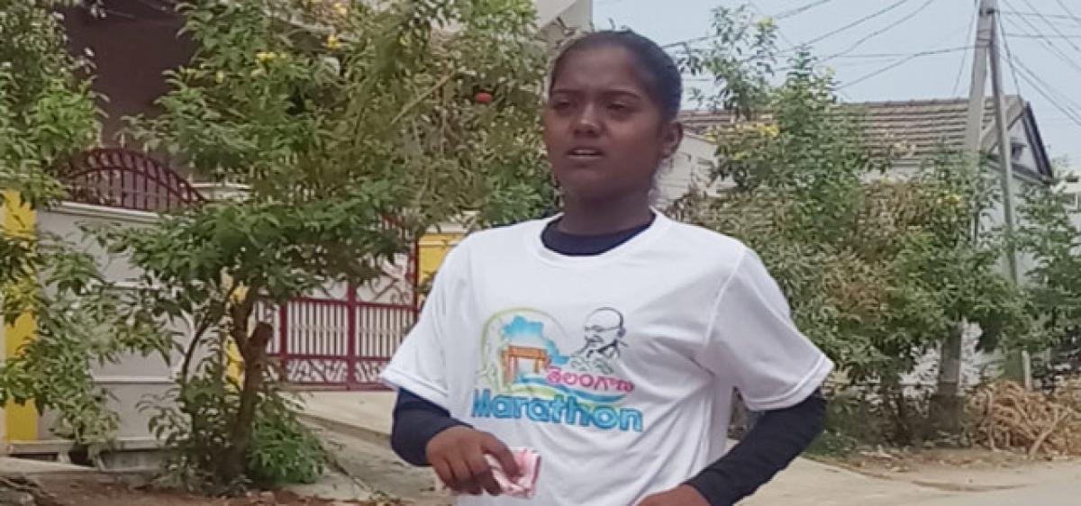 Girl on mega marathon for Swachh Telangana