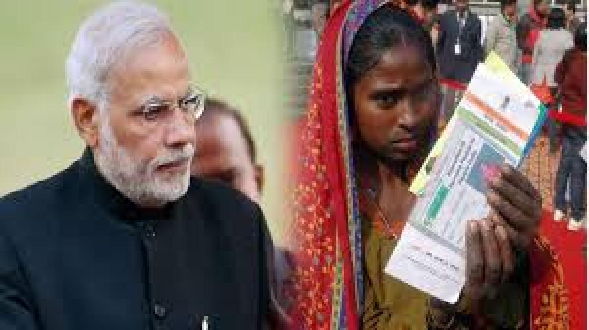 Modi reviews Aadhaar benefits scheme