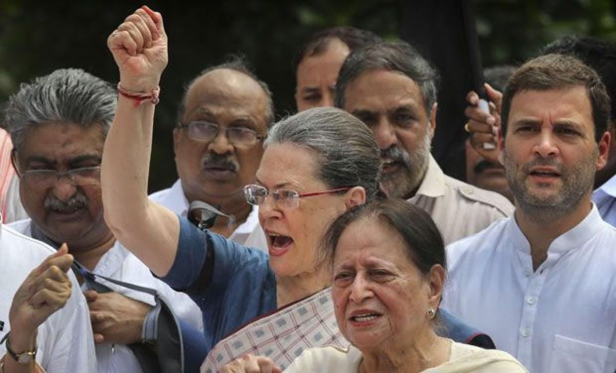 Murder of democracy, says Sonia Gandhi as she leads protest against suspension of lawmakers