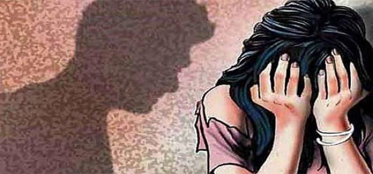 Student held for harassing woman