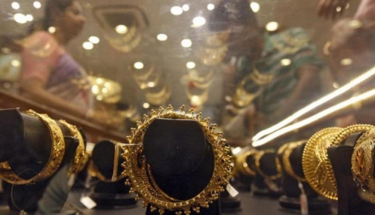 Gold climbs Rs 48 on positive global cues